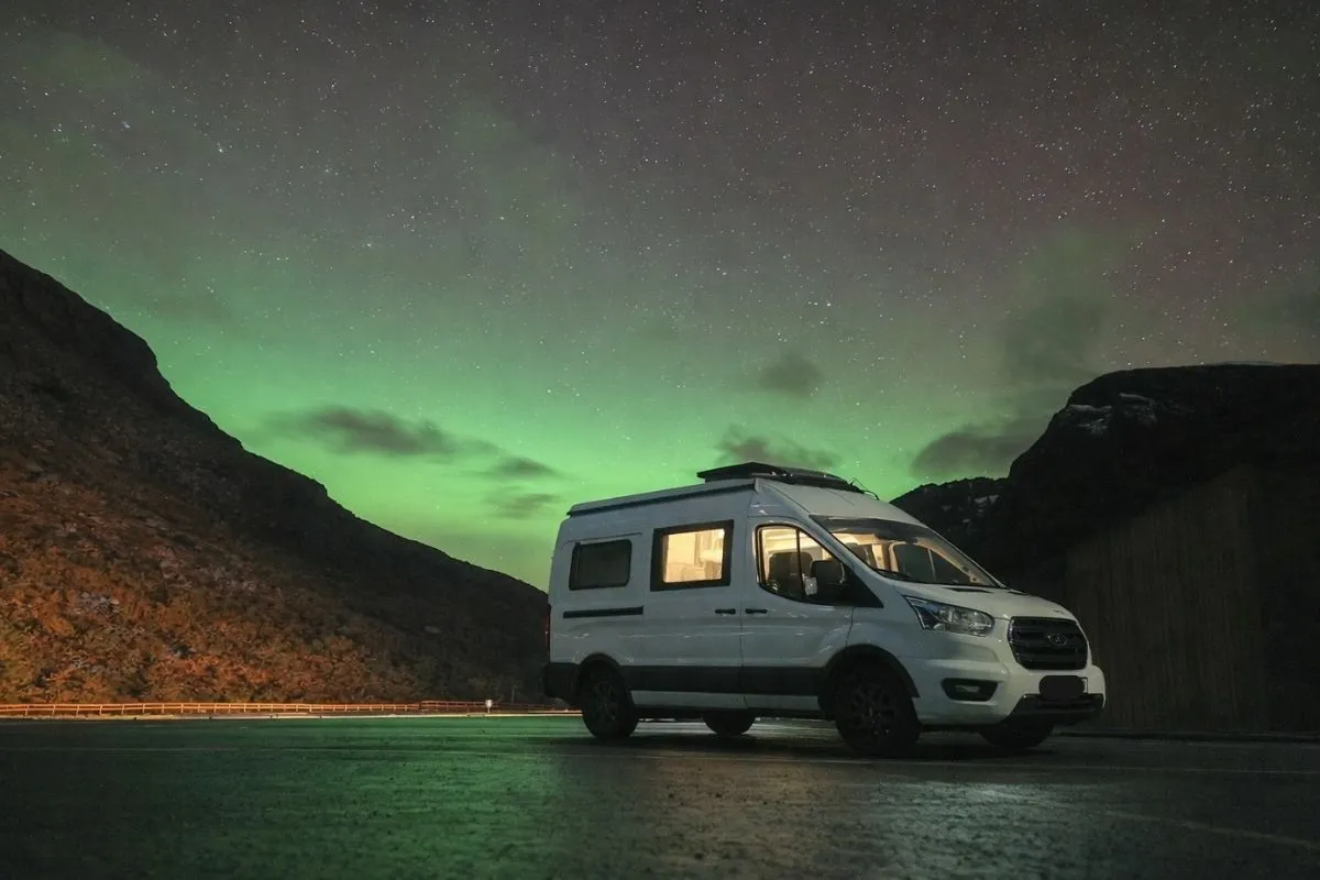 City Campervan under April Northern Lights rented in Norway